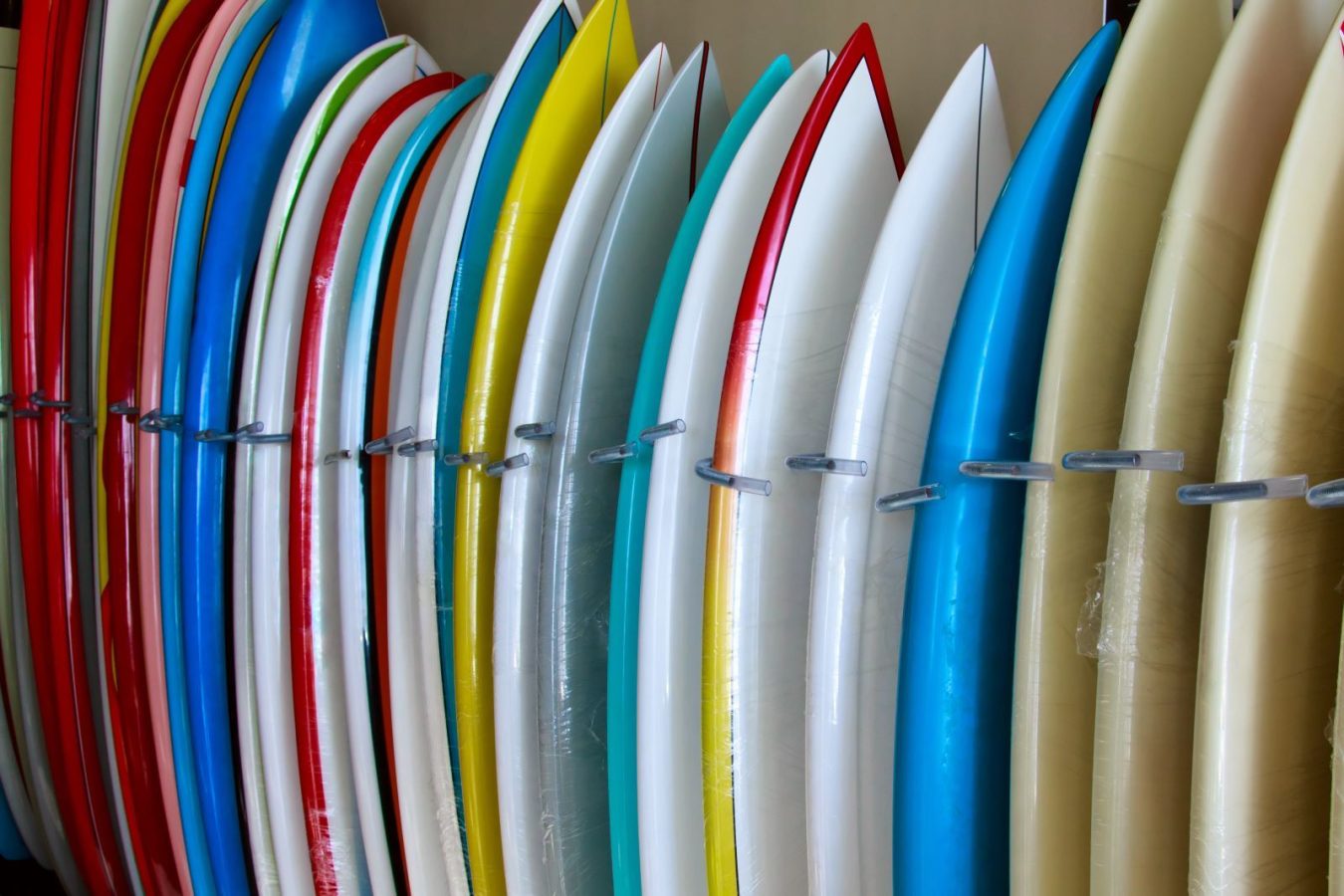 surf-boards-in-rack-at-store
